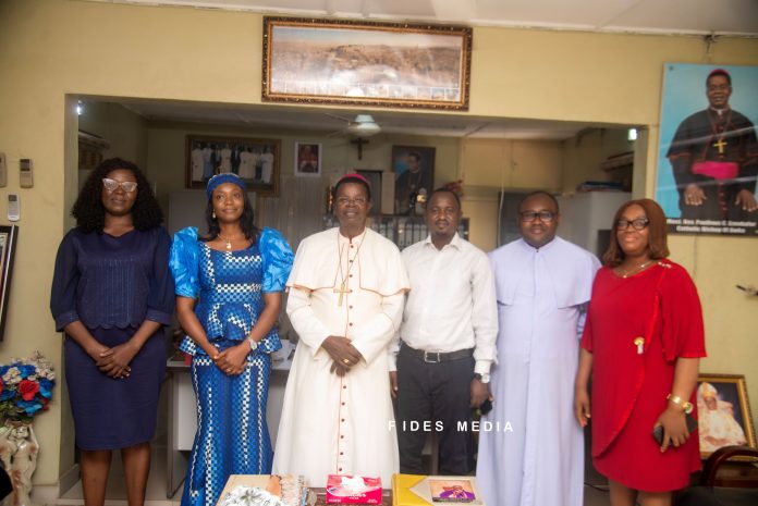 Group picture with his lordship Most Rev. Paulinus Ezeokafor, the Team; the chancellor of Awka Diocese ,among others